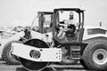 construction worker man used construction heavy machinery equipment on building industry site for roadwork outdoor Royalty Free Stock Photo