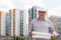 A construction worker man in white helmet holding Royalty Free Stock Photo