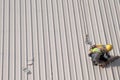 Construction worker marking roof Royalty Free Stock Photo