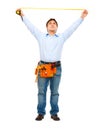 Construction worker measuring with ruler Royalty Free Stock Photo