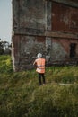 Construction Worker Measuring And Testing An Old Wall Outdoor Royalty Free Stock Photo