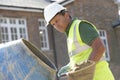 Construction Worker Mixing Cement