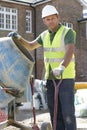 Construction Worker Mixing Cement