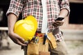 Construction worker with mobile phone