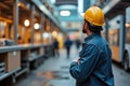 Construction Worker Observing Project Progress in Urban Setting During Daytime Royalty Free Stock Photo