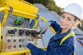 Construction worker operating truck elevator