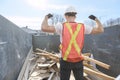 Construction Worker outside of house put old renovation material on big conteiner Royalty Free Stock Photo