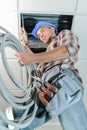 construction worker placing hoses Royalty Free Stock Photo