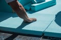 Worker placing XPS polystyrene boards