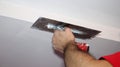 Construction Worker Plastering Ceiling With Work Tool Royalty Free Stock Photo