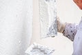 Construction worker plastering and smoothing concrete wall with cement Royalty Free Stock Photo