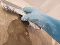 Construction Worker Plastering Wall with Trowel, Skilled Trade and Renovation Royalty Free Stock Photo