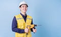 Construction worker portrait on blue background Royalty Free Stock Photo