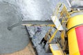 Construction worker pouring concrete from cement truck, people worker Royalty Free Stock Photo