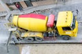 Construction worker pouring concrete from cement truck, people worker Royalty Free Stock Photo