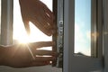 Construction worker putting sealing foam tape on window, closeup Royalty Free Stock Photo