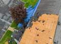 Construction worker on renovation roof the house installed new shingles Royalty Free Stock Photo