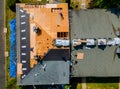 Construction worker on renovation roof the house installed new shingles Royalty Free Stock Photo