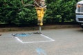 Construction worker repairing road with Jackhammer Royalty Free Stock Photo