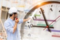 Construction worker with schedule project timeline and working time clock for control timing punctual building process concept Royalty Free Stock Photo