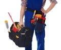Construction worker with set of tools on white background Royalty Free Stock Photo