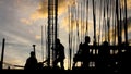 Construction worker silhouette on the work place