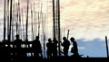 Construction worker silhouette on the work place Royalty Free Stock Photo