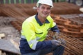 Construction worker at construction site assembling falsework