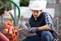 construction worker at construction site assembling foundation