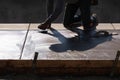 Construction Worker Smoothing Wet Cement With Hand Edger Tool Royalty Free Stock Photo