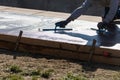 Construction Worker Smoothing Wet Cement With Trowel Tools Royalty Free Stock Photo