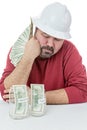 Construction worker splitting money Royalty Free Stock Photo