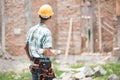 Construction worker standing in front of the building site Royalty Free Stock Photo