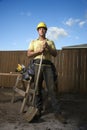 Construction Worker Standing with Shovel Royalty Free Stock Photo