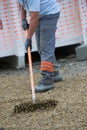 Construction worker sweeping on the building construction site Royalty Free Stock Photo