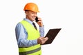 Construction Worker Talking On Phone Holding Folder Over White Background Royalty Free Stock Photo