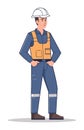 Construction worker in uniform and safety helmet standing confidently. Male builder in workwear with hands on hips