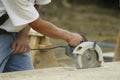 Construction Worker Using a Circular Saw