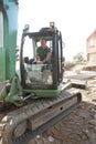 Construction Worker Using Digger