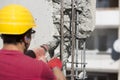 Construction worker using a drilling power tool Royalty Free Stock Photo