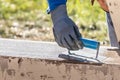 Construction Worker Using Hand Groover On Wet Cement Forming Coping Around New Pool Royalty Free Stock Photo