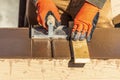 Construction Worker Using Hand Groover On Wet Cement Forming Coping Around New Pool Royalty Free Stock Photo