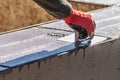 Construction Worker Using Hand Groover On Wet Cement Forming Coping Around New Pool Royalty Free Stock Photo