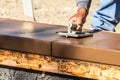 Construction Worker Using Hand Groover On Wet Cement Forming Coping Around New Pool Royalty Free Stock Photo