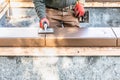 Construction Worker Using Hand Groover On Wet Cement Forming Coping Around New Pool Royalty Free Stock Photo