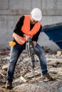 Construction worker using a jackhammer Royalty Free Stock Photo