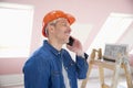 Construction worker using mobile phone Royalty Free Stock Photo