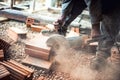 Construction worker using a professional angle grinder for cutting bricks and building interior walls Royalty Free Stock Photo