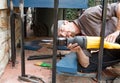 Worker Cutting Wrought Iron Post Royalty Free Stock Photo