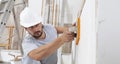 Construction worker are using sponge and plastering trowel to smooth the walls. Home improvement, hands plasterer man at work in Royalty Free Stock Photo